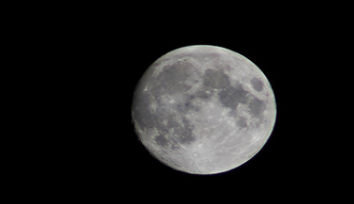 A photograph shows the moon.
