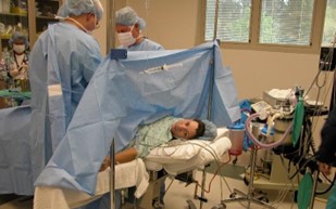 Woman receiving a C-section