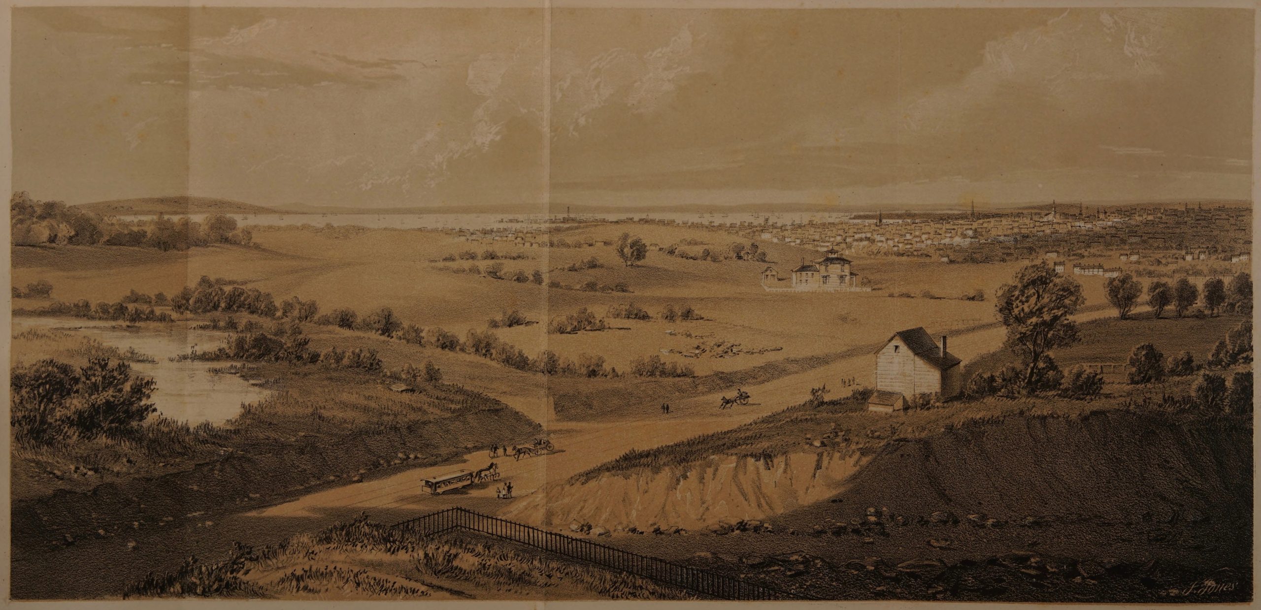 a view of gently sloped grassy hills with a tavern and road in the foreground