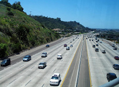 At right, the cars in the distance appear smaller than those nearer to us.