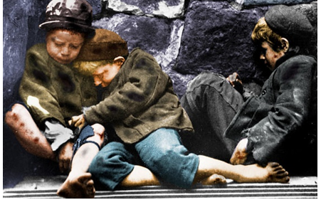 Children sleeping in the corner of a street