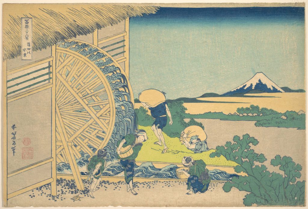 A waterwheel and workers in 19th century Japan.