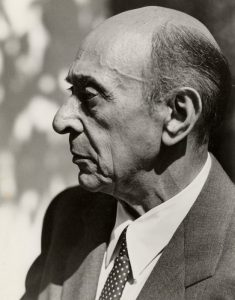 a black-and-white portrait of an older white man in profile
