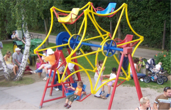 A photograph shows children climbing on playground equipment.