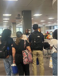Group of students receiving a library tour.