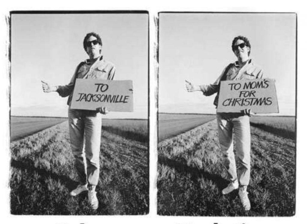 Side by side comparison of two similar black and white images of a young, white male hitchhiker on a grassy plain. In both images he is wearing the same casual clothing, tennis shoes and sunglasses, while holding his right hand out and thumb up and a sign in his left hand. The signs and his expression are different in each image. In the left image, his sign reads "To Jacksonville" and he looks serious. In the right image, the sign reads "To Mom's For Christmas" and he's smiling.